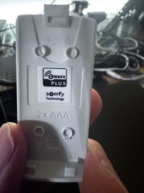 Back of the Bali remote showing Z-Wave Plus and Somfy markings